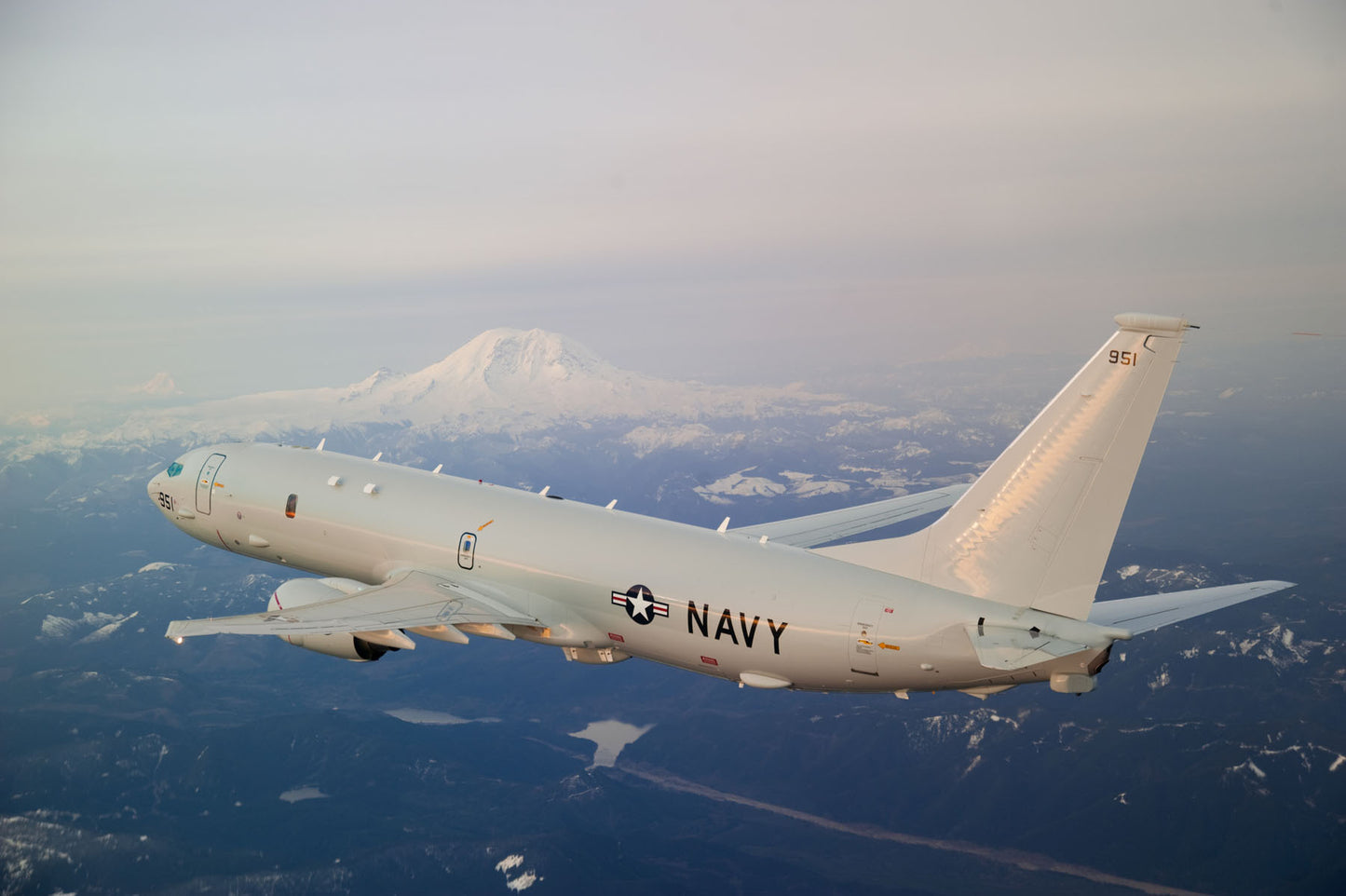 US Navy P-8A Poseidon flies above Mt. Rainier BI232429