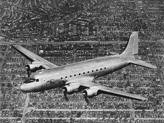 DC-4 in Flight Above Los Angeles BI2436