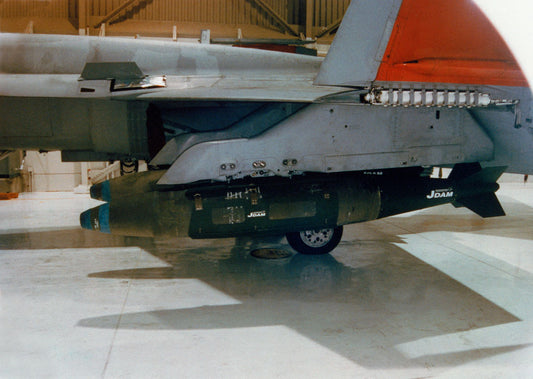 Joint Direct Attack Munition (JDAM) Mounted On A Fighter Jet BI218598