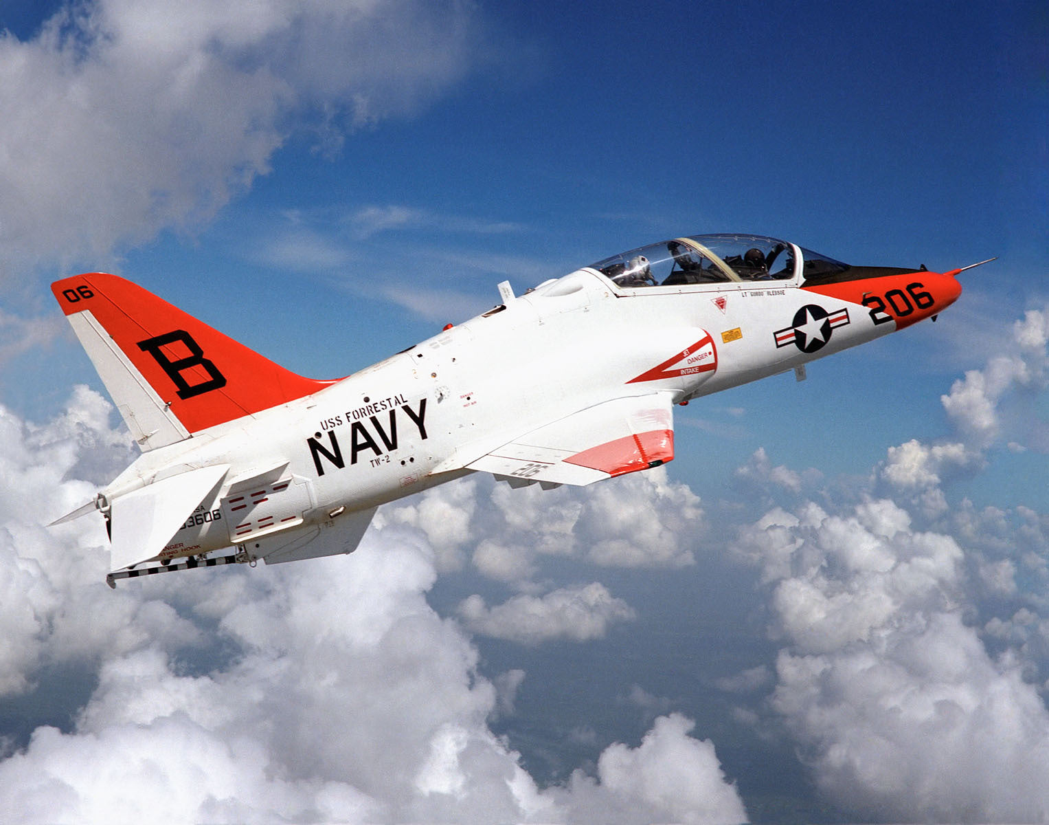 T-45 Goshawk in Flight Over Clouds BI24534