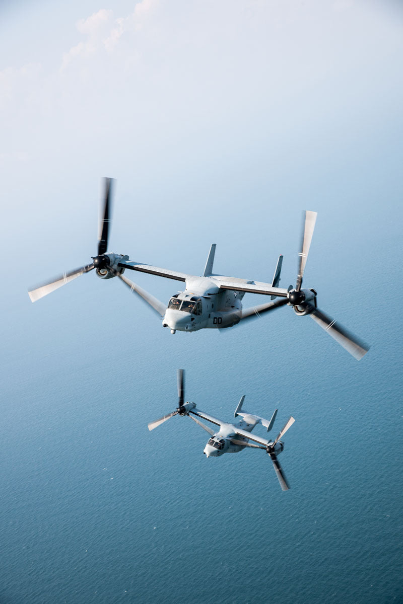 V-22 Ospreys Bank Left over Ocean BI43983