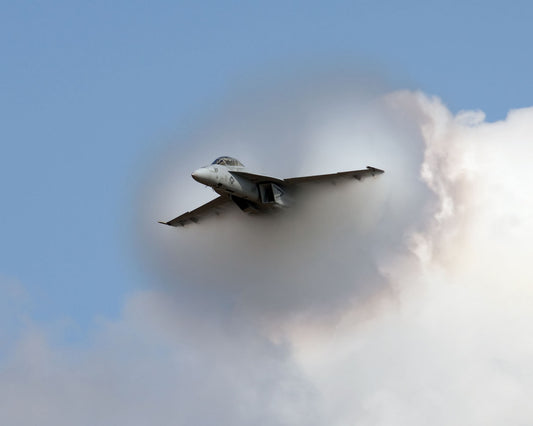 F/A-18E/F Super Hornet Generates a Condensation Cloud at High Speed BI218242