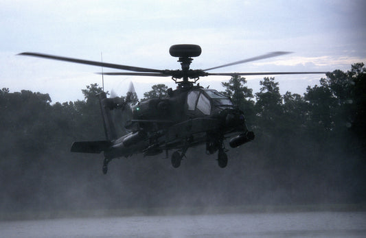 AH-64D Apache Longbow Hovers over Lake BI218474