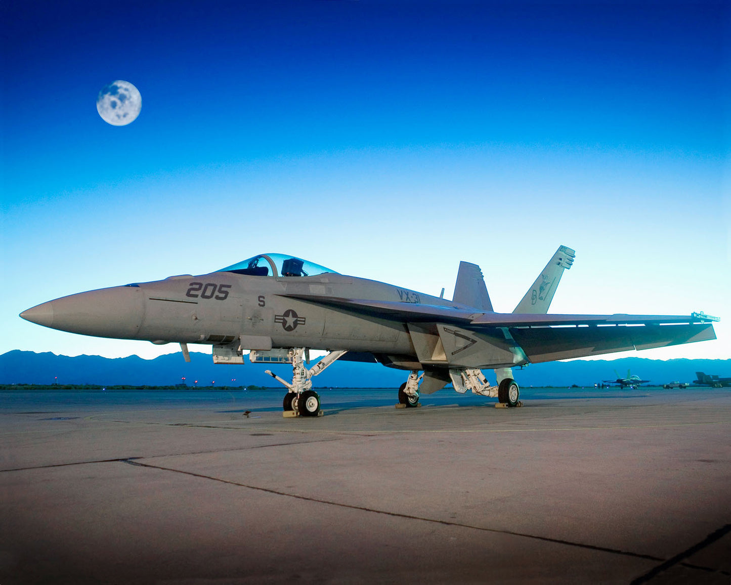 F/A-18E Super Hornet Below a Full Moon BI220799