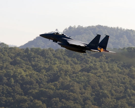F-15K Strike Fighter Ascends with Afterburners Lit BI221483
