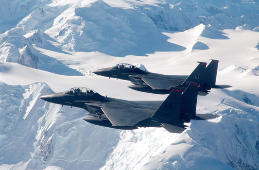 Twin F-15E Strike Eagles in Flight over the Alaskan Wilderness BI227705