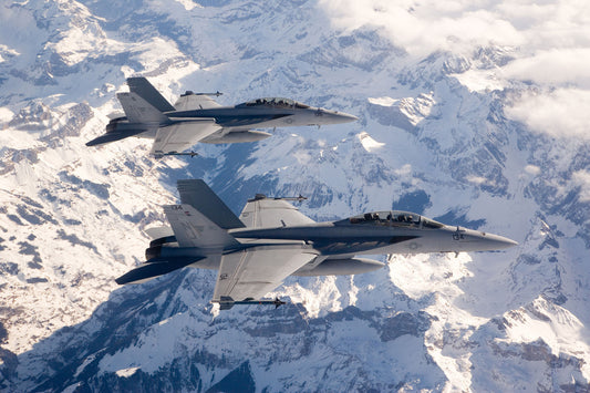 F/A-18F Super Hornets in flight over Mountains. BI232425